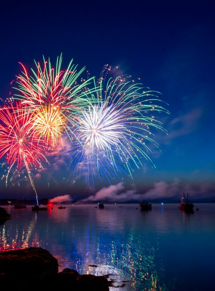 green, red, and white fireworks on sky at nighttime